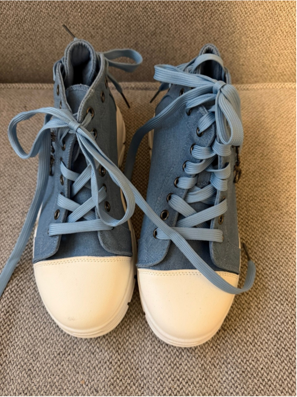 casual blue canvas high-top platform sneakers featuring a contrast white toe cap